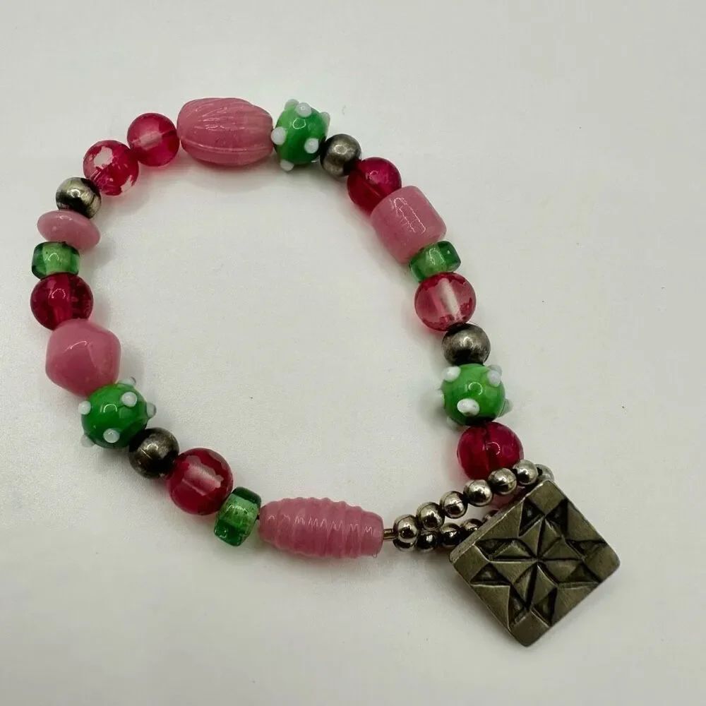 D.P. Limited pink and green beaded bracelet